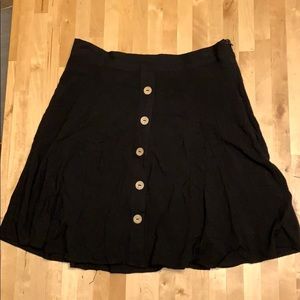 Black button front skirt